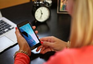 woman looking at phone