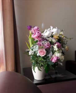 flower pot that is stored on the living room table